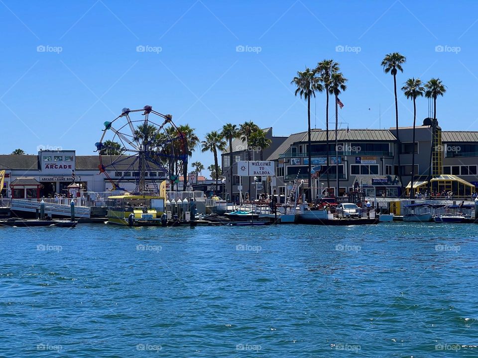 View of the Balboa Fun Zone from the Balboa Island Ferry crossing the Entrance Channel in Newport Beach California