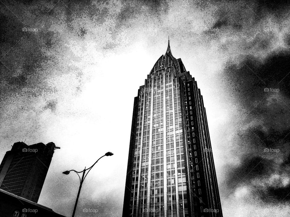 grainy black and white skyscraper