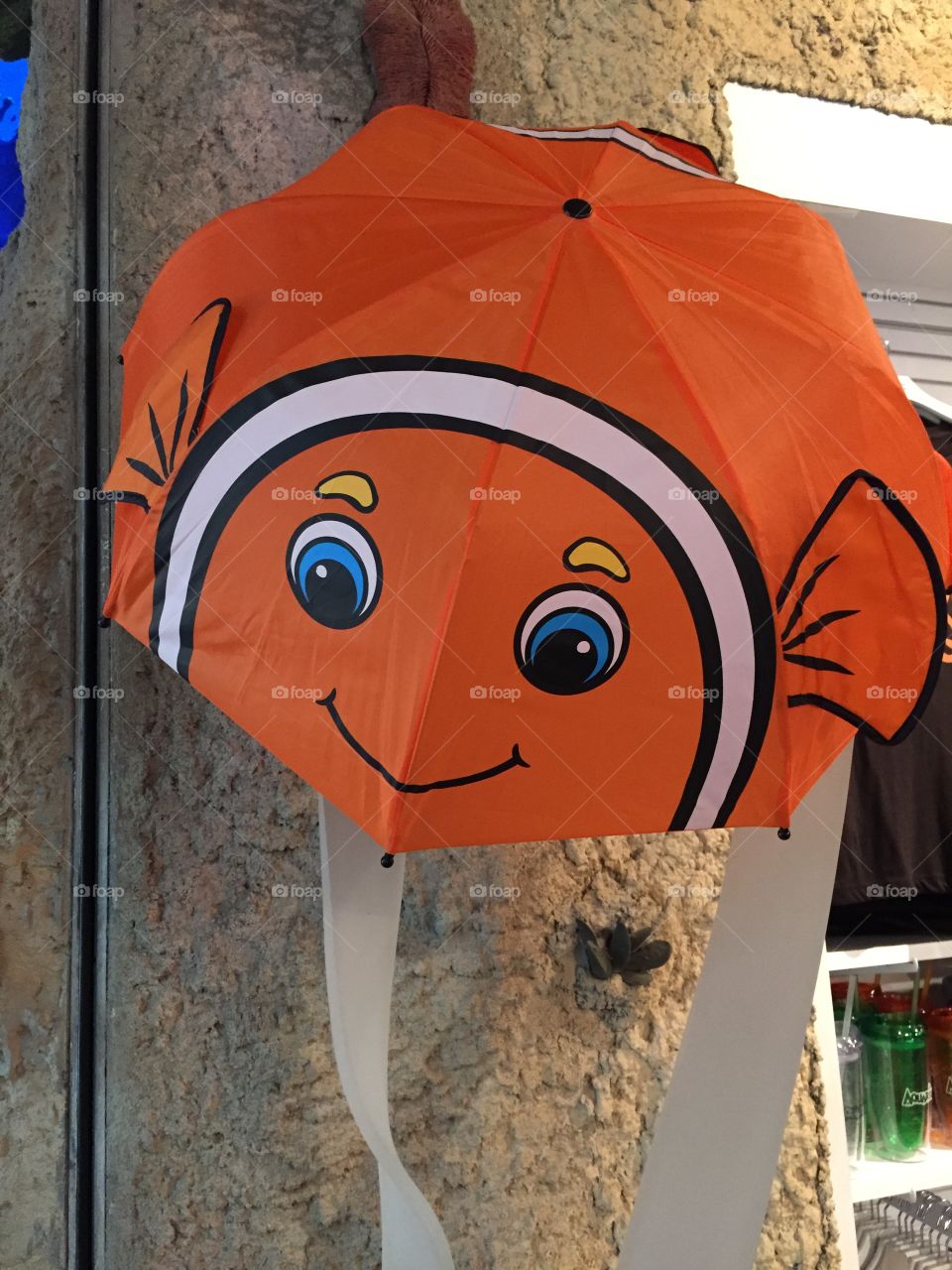 Child's orange umbrella