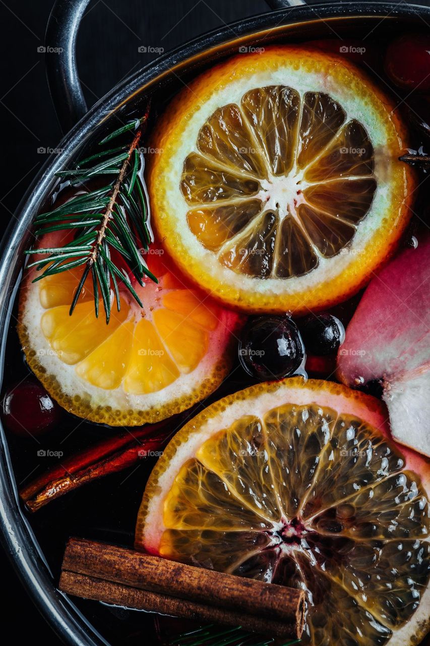 winter festive hot wine in a dark surrounding