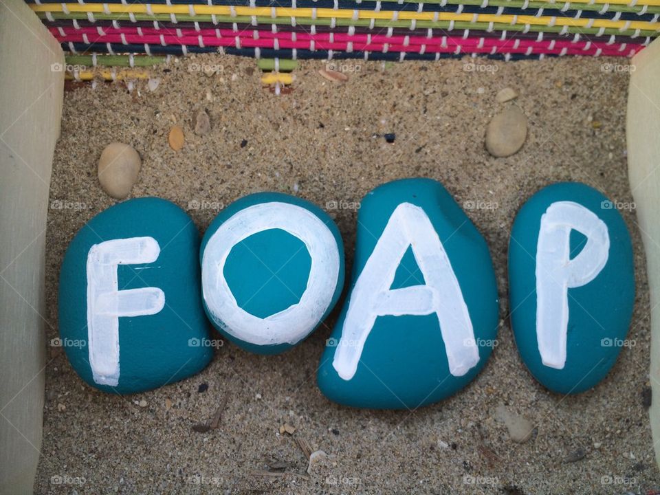 Foap on turquoise stone letters