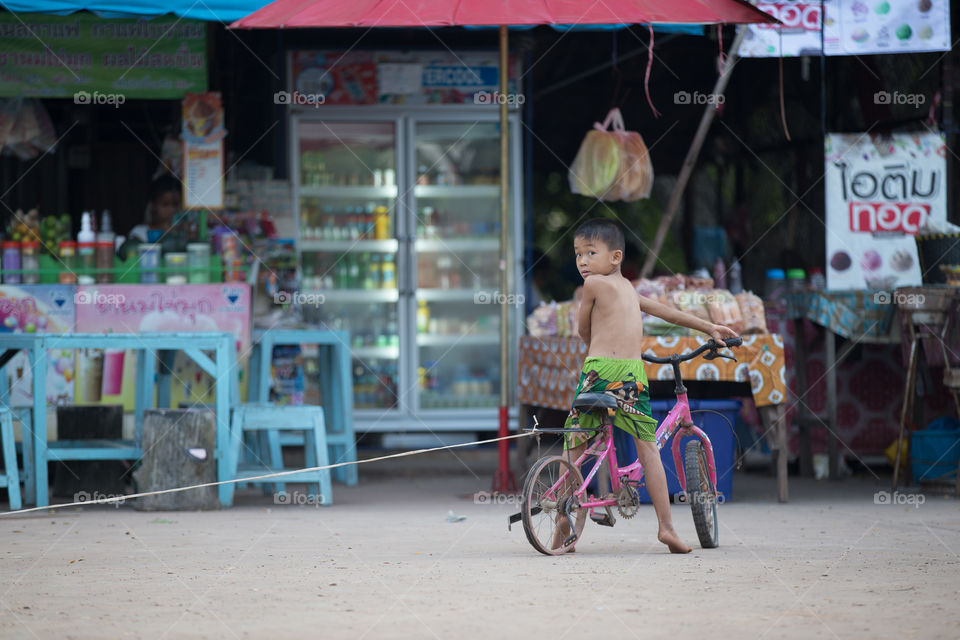 Child riding bicycle