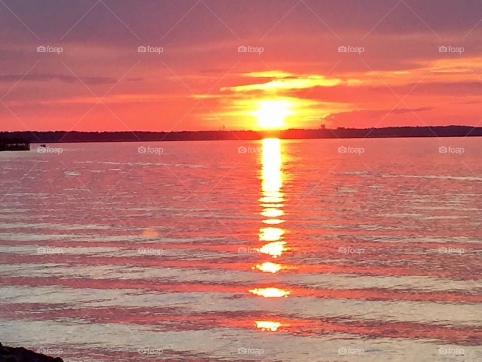 Colorful sunset over water