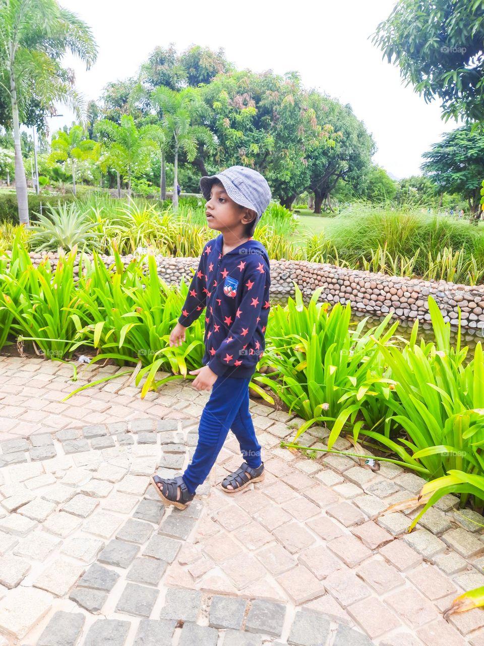 Boy walking in the park