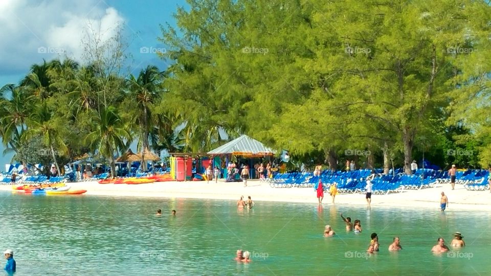 Tons of vacationers at the beach Coco cay Bahamas Royal Caribbeans Private island