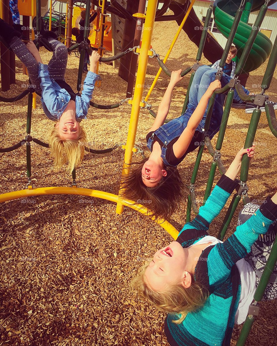 Happy girls enjoying at playground