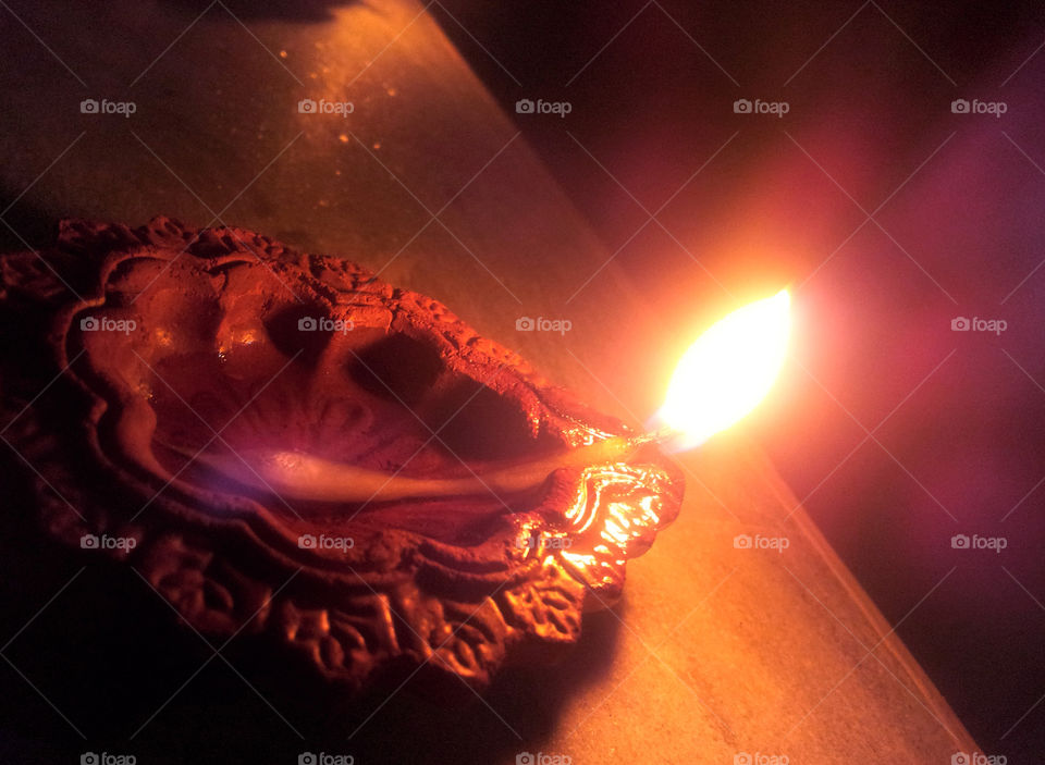 Close-up of oil lamp