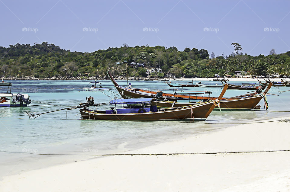 The beauty of the summer sea and the ship on the beach , Koh Lipe , Satun in Thailand.