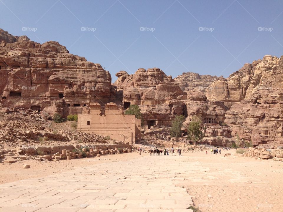 Tourists admiring the ruins of Petra,
Jordan.