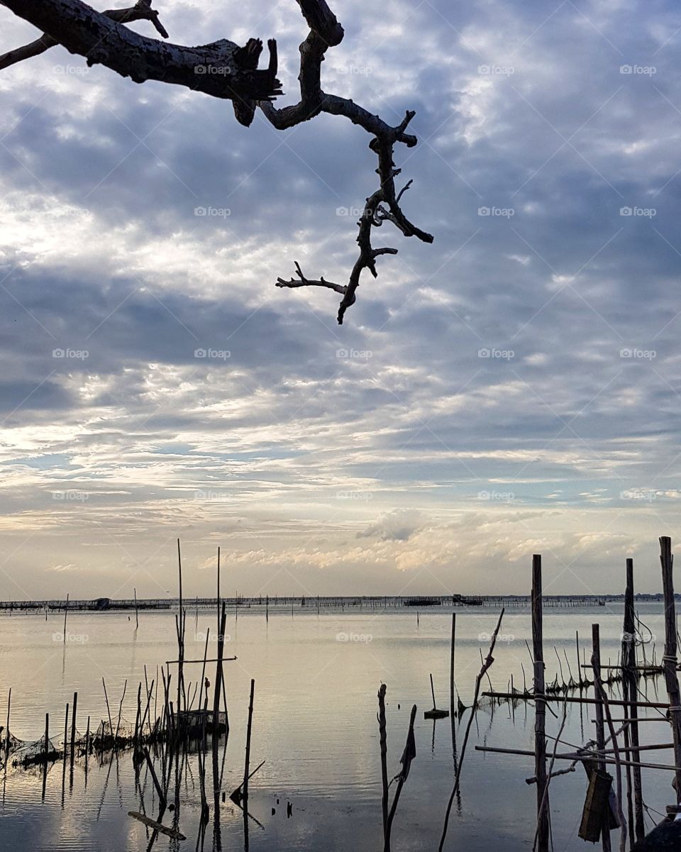 Scenic view of lake against blue sky