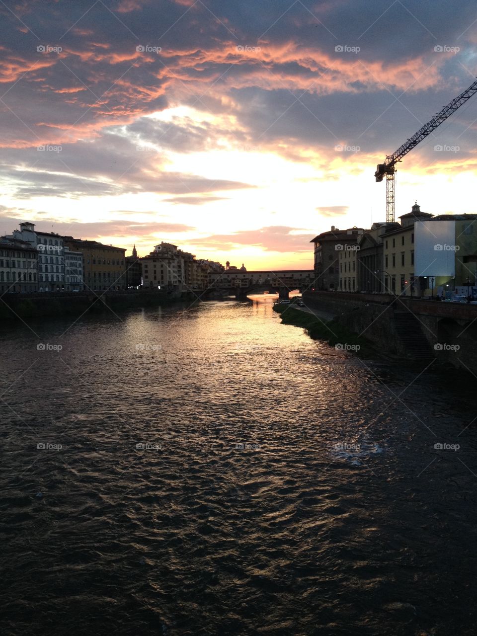 Arno River at sunset in Florence, Italy