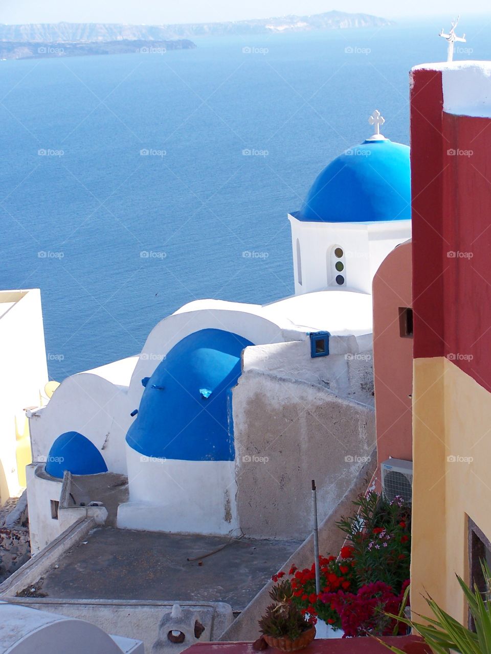 Blue dome of Greek Orthodox Church in Santorini in the village of Oia in Greece