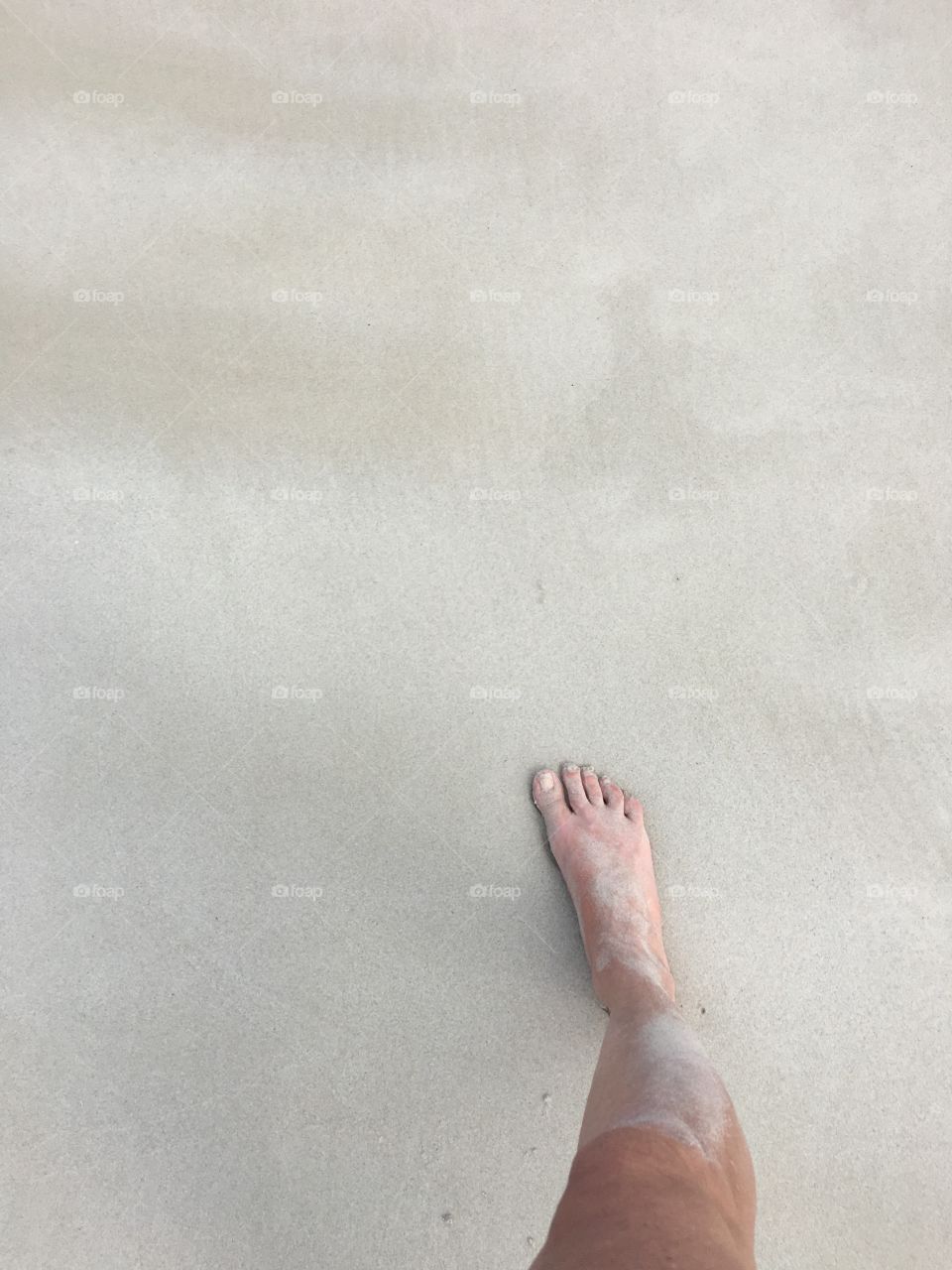 Foot on beach