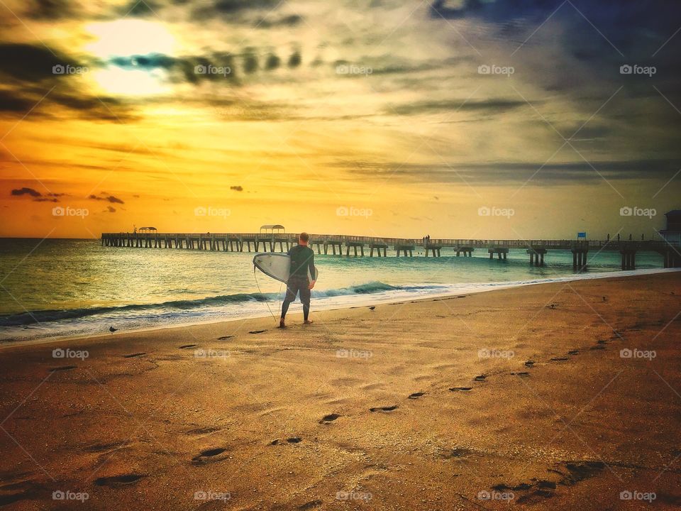 Surfer with surfboard 