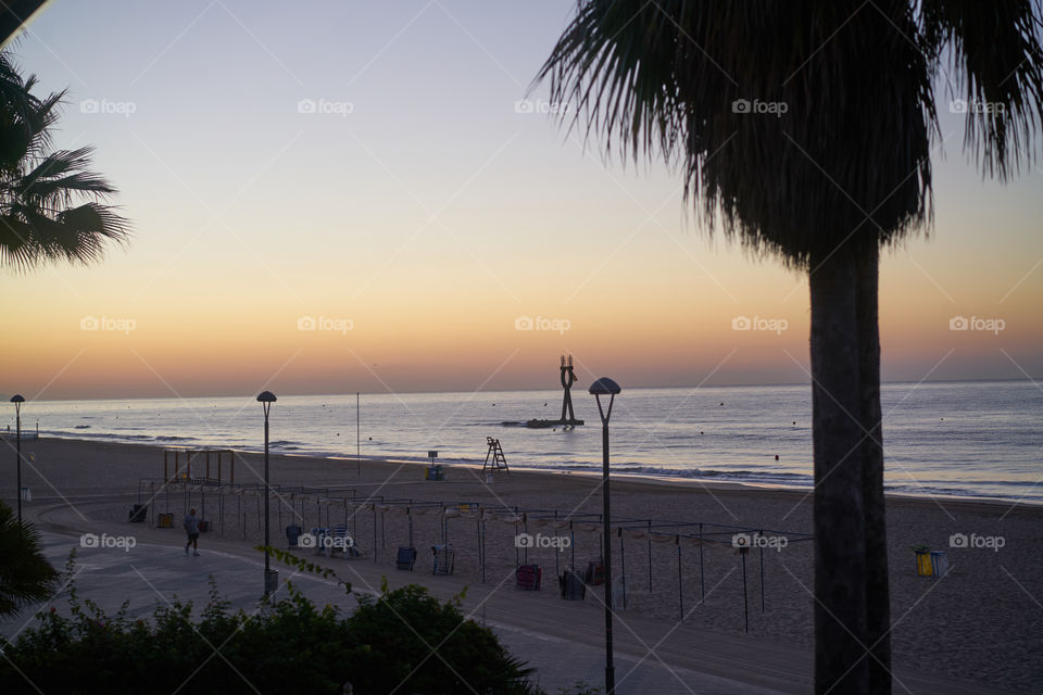 View of beach during sunset