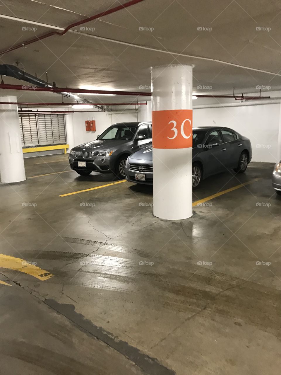 Cars parked in an underground parking garage 