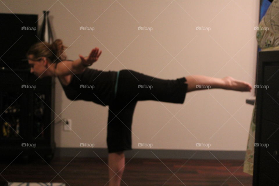Yoga woman instructor at home