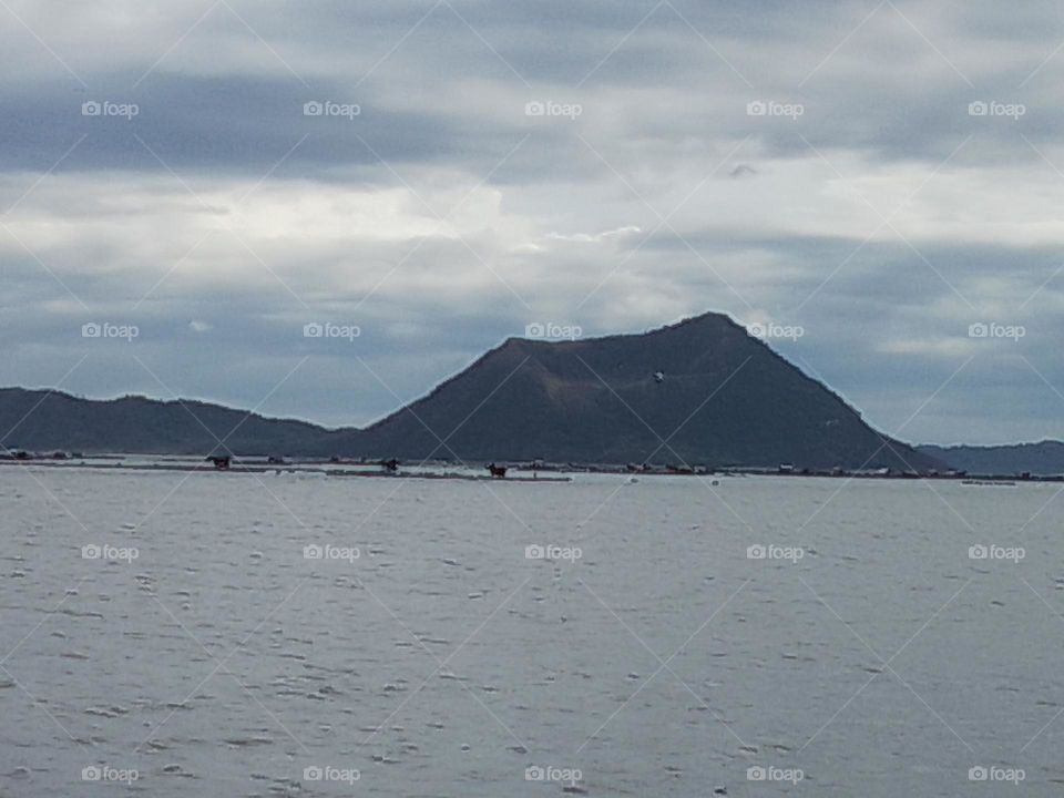 Taal Volcano is a large caldera filled by Taal Lake in the Philippines. Located in the province of Batangas, the volcano is second of the most active volcanoes in the country, with 38 recorded historical eruptions.