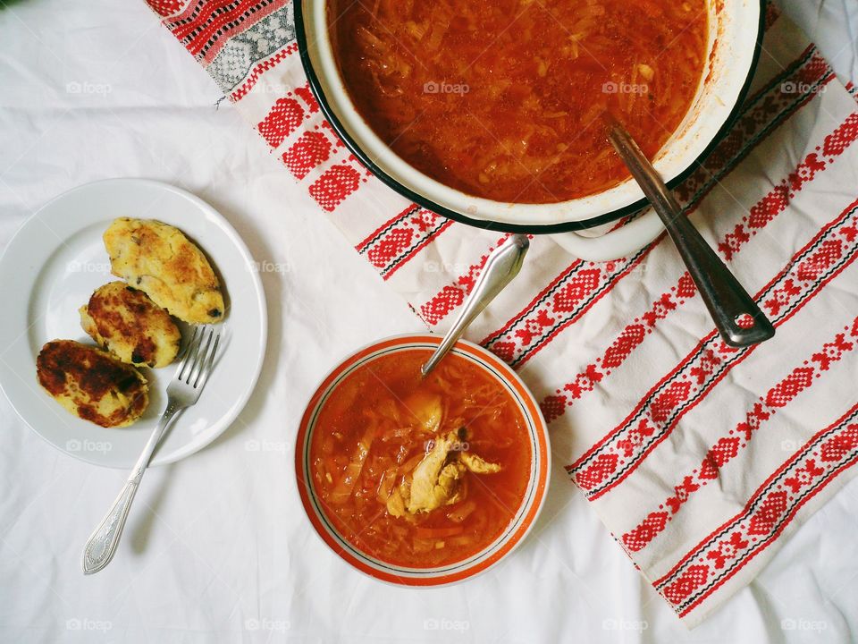 Ukrainian borscht, pies with meat on the table