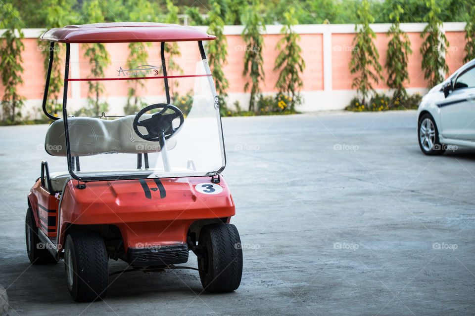 Golf car in the road