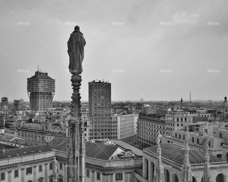 Duomo cathedral view. Past watching the present on the top of Duomo cathedral in Milan