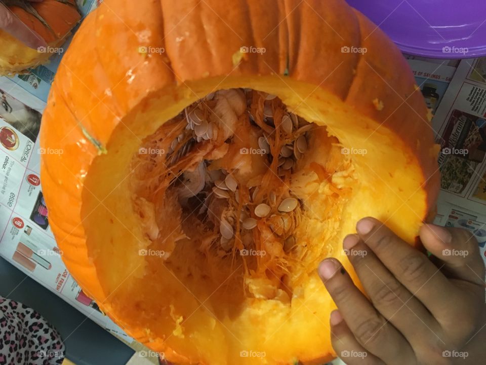 Gutting a pumpkin