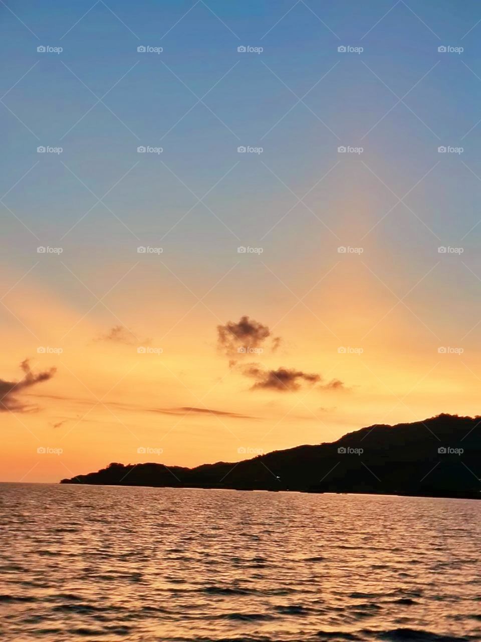 environment sunshine reflection peaceful day island air calm coast abstract tropical vacation golden panoramic tree season tranquil atmosphere tourism scenery seascape cloudy paradise natural panorama weather heaven clouds cloudscape bright scene col