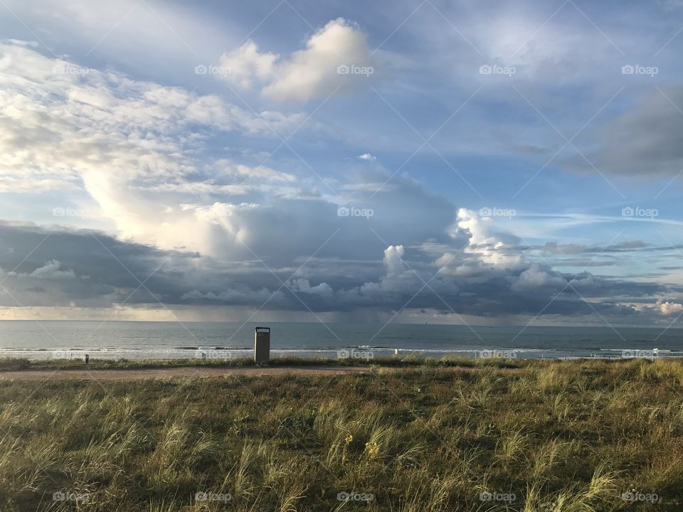 Stormy rain clouds above the sea