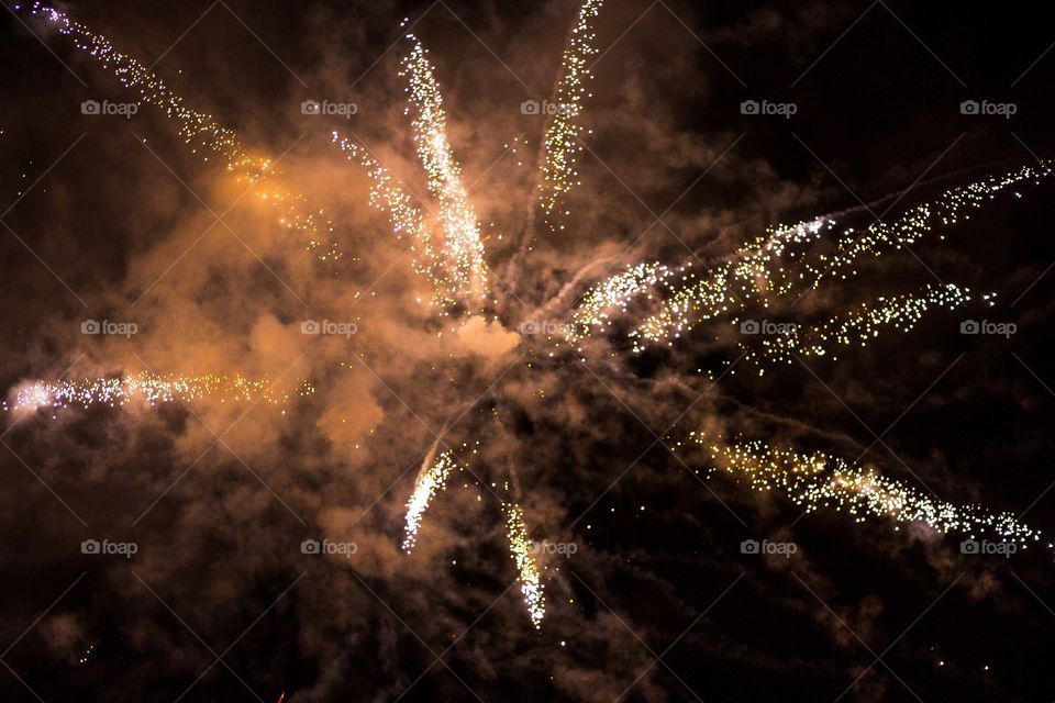 fireworks in the night sky, artificial lighting