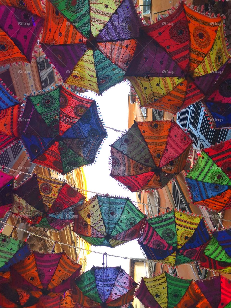 Beautiful colourful umbrellas. Look on the sky 😉. Multiverse.