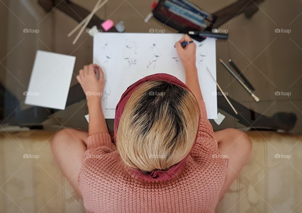 girl practicing drawing