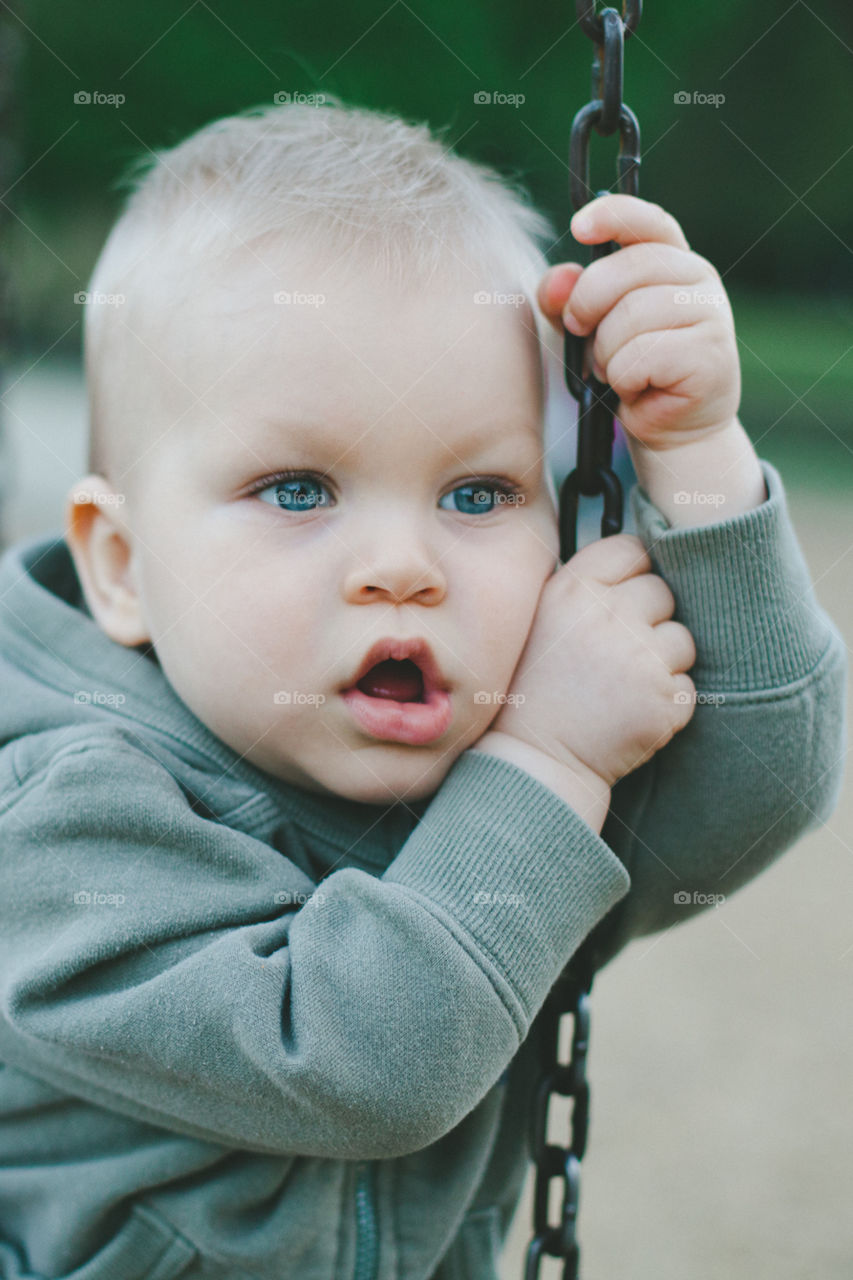 Baby boy on the swing