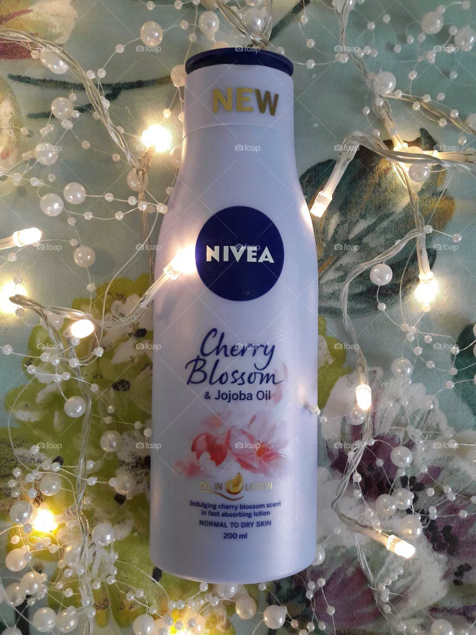 Nivea cherry blossom body lotion with fairy lights pearls and flowers