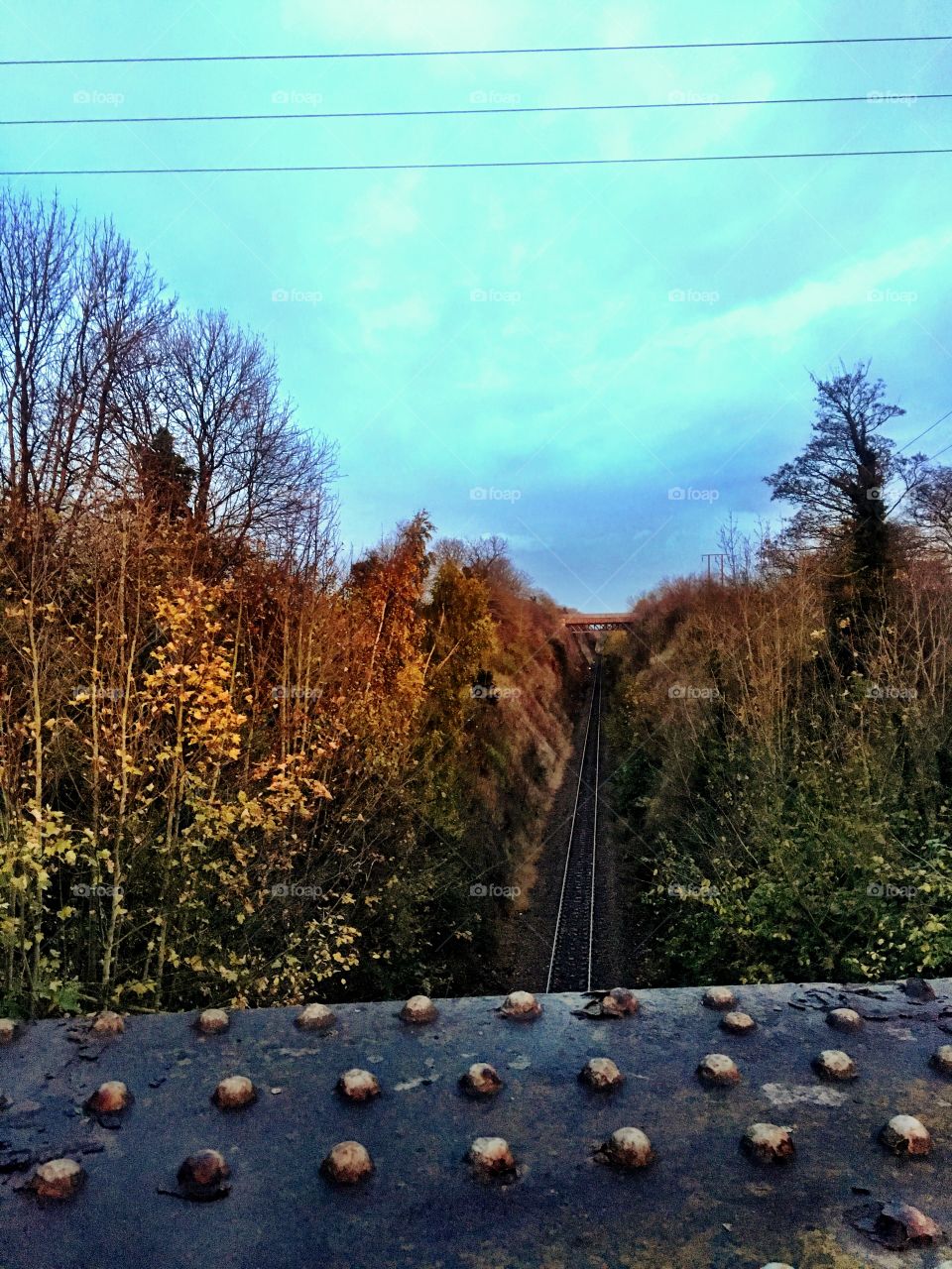 Autumn evening on a railway bridge