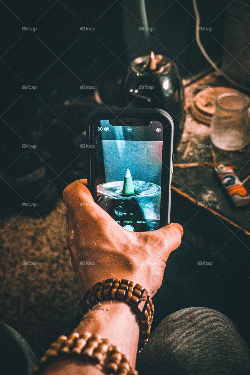 Taking a picture in a picture wearing my hands.