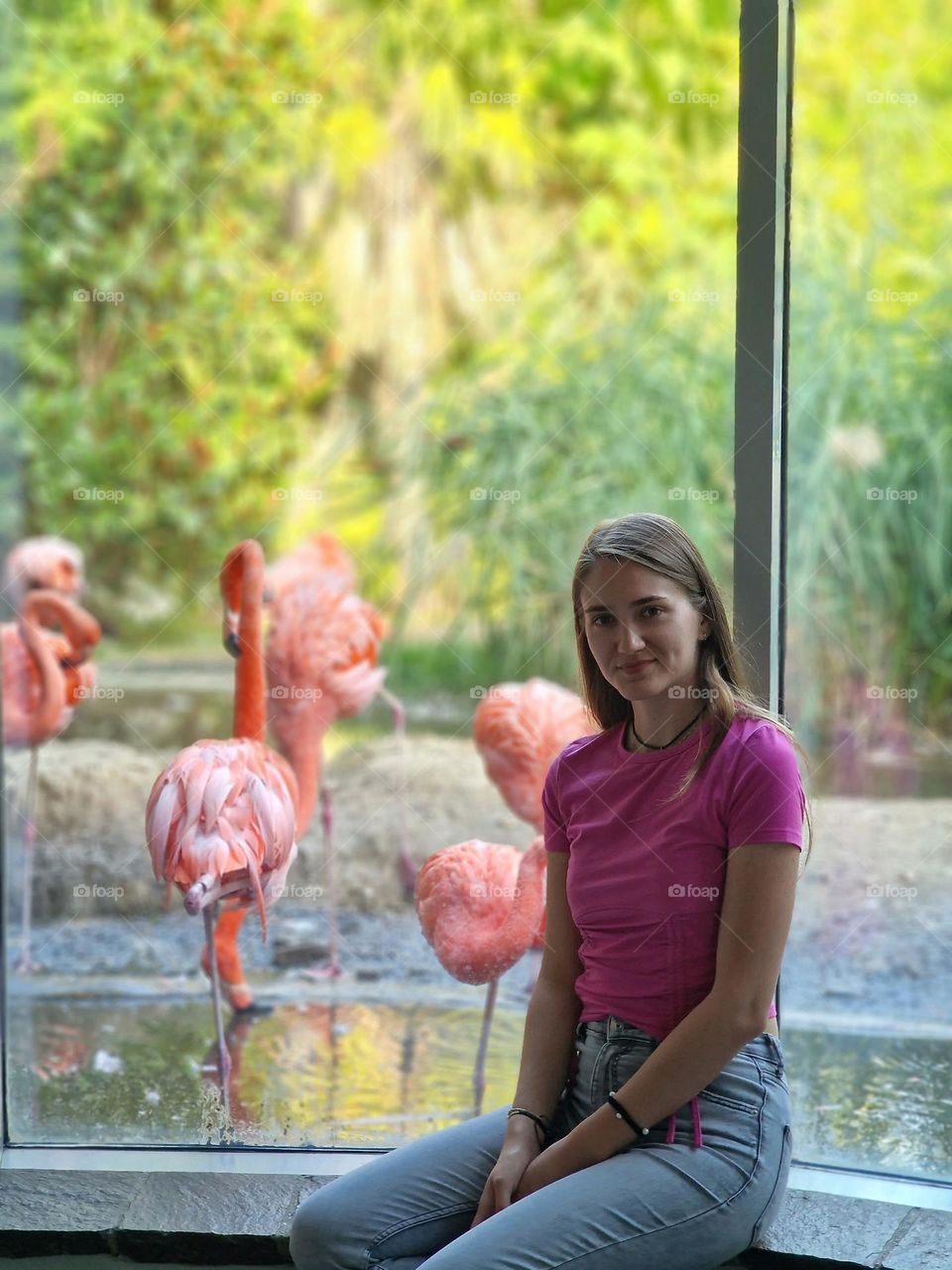 pretty girl with flamingo birds