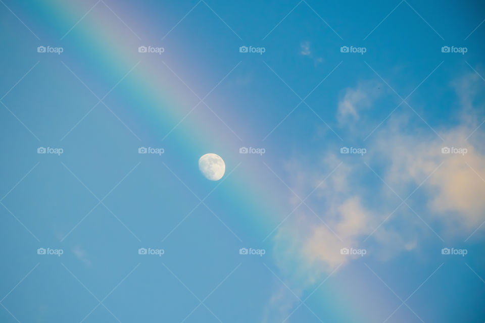 Close-up of moon and rainbow