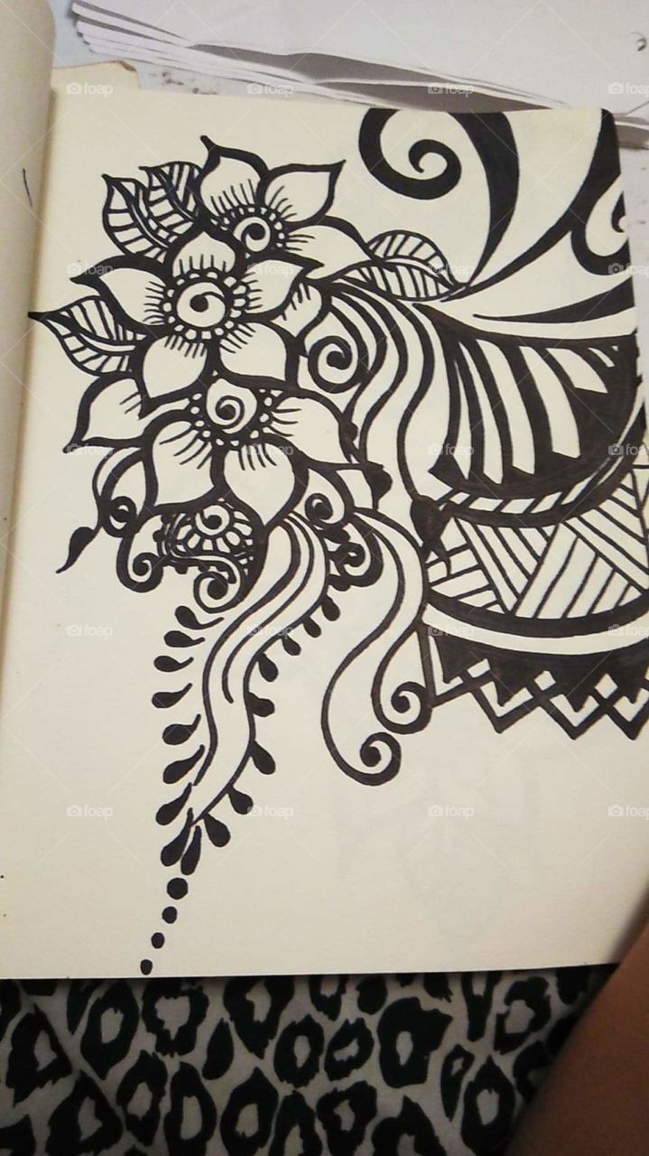 Flower and patterns sketched for my henna designs.