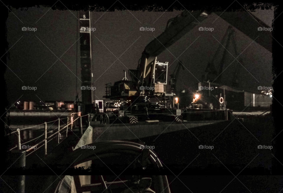 Ship digger at night. Night-time view of the ship mounted big digger