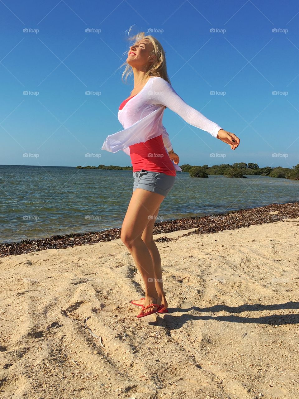 Joyful woman at beach