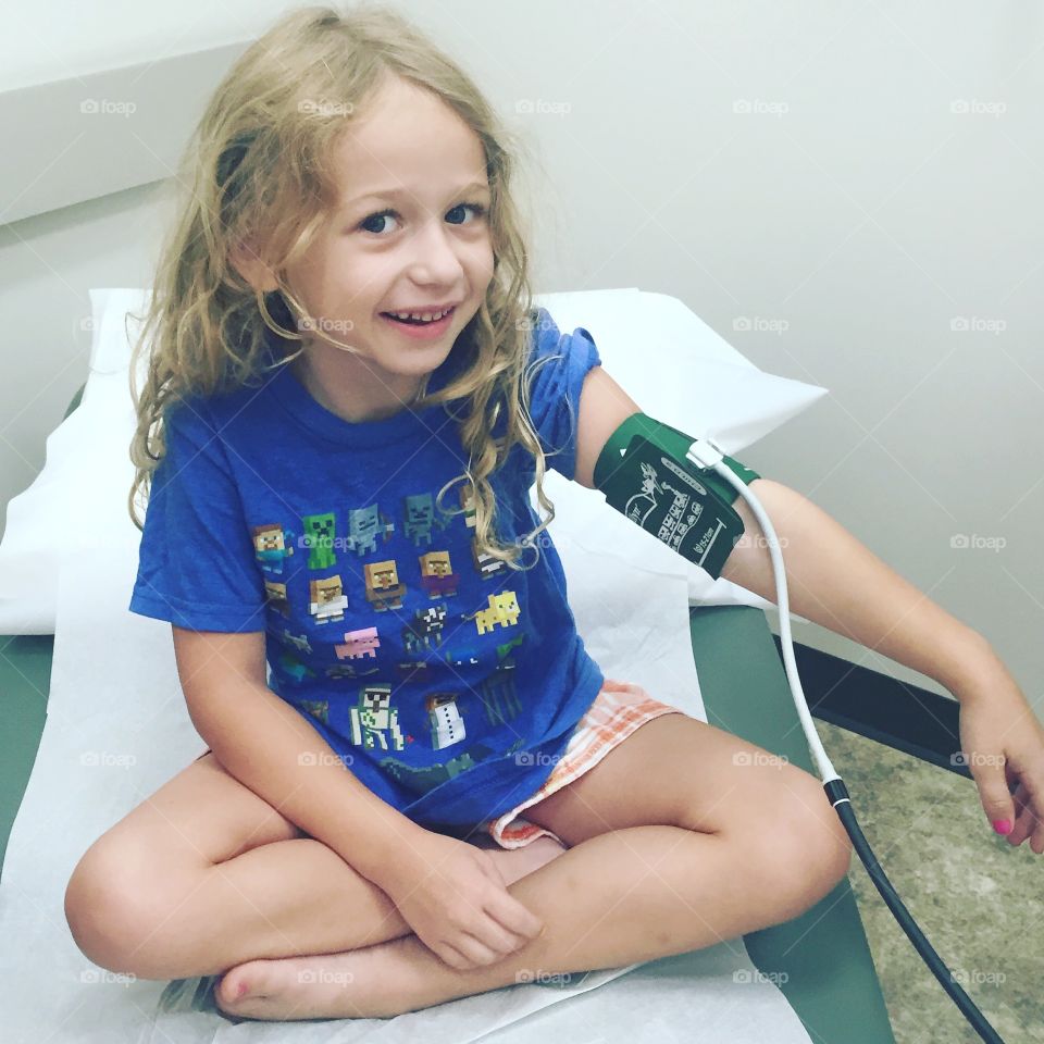 Smiling little girl in clinic