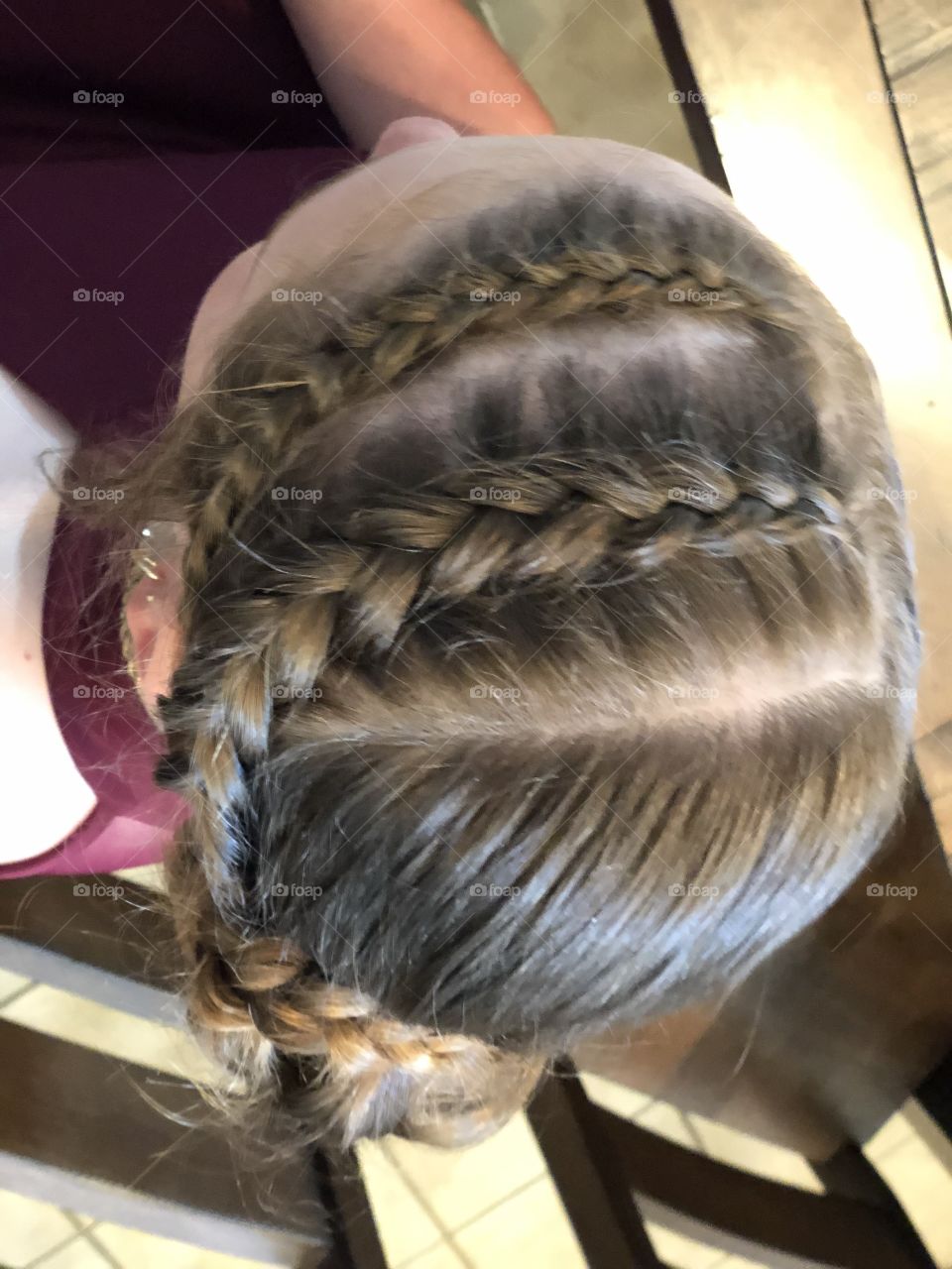 Hair model with multiple braids ready for prom
