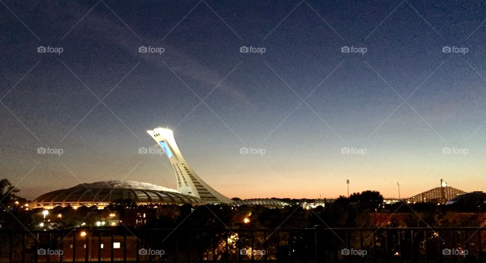 Montreal's Olympic Stadium at dusk 