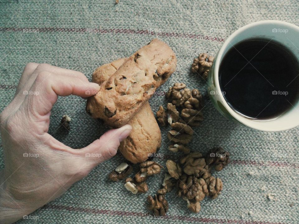 Women's hands hold cookies