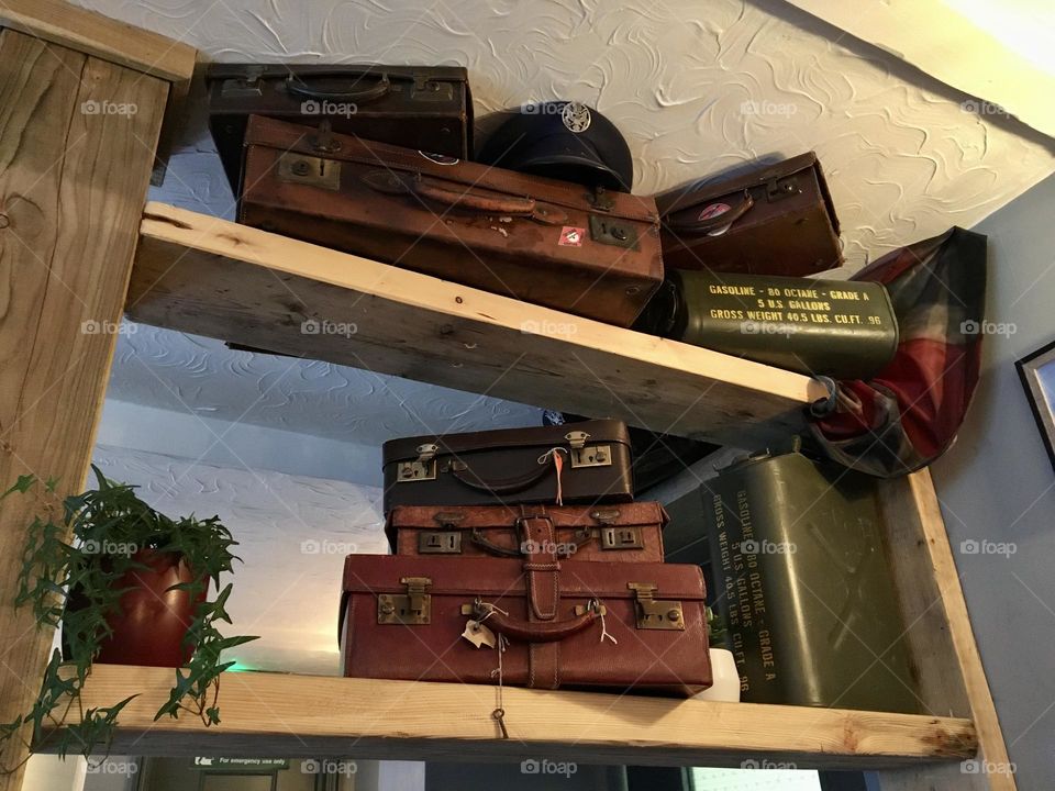 Suitcase decor on a shelf 