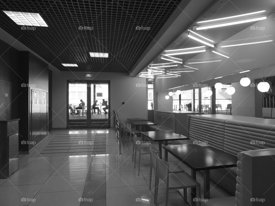 Silhouette. Conversation. Silhouettes of talking people. A cafe.