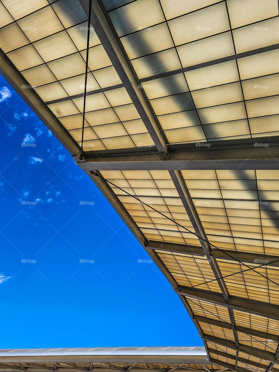 Architectural overhang outside of Oakland International Airport curbside in Oakland California 