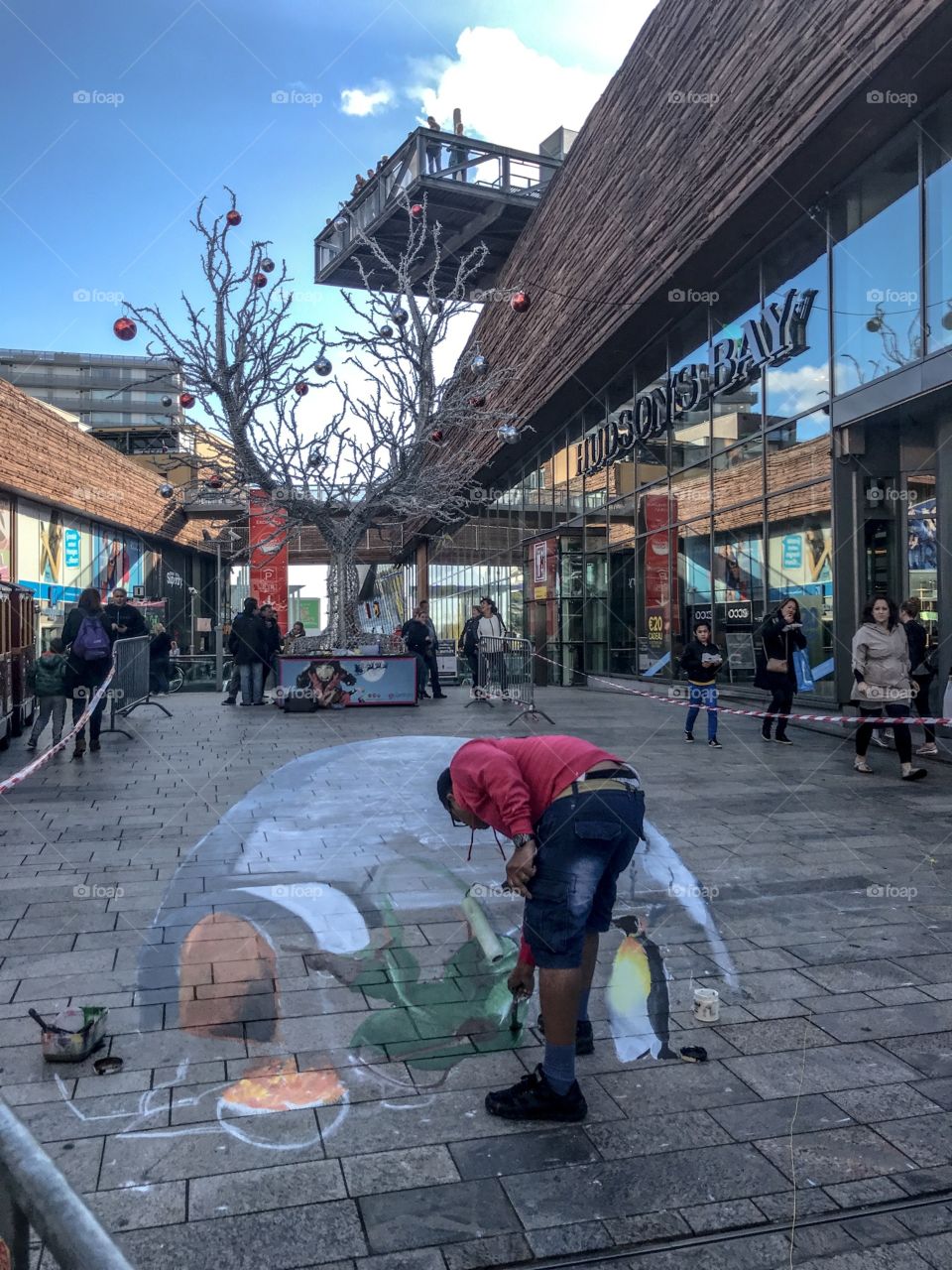 Creating 3d art on the pavement in the city