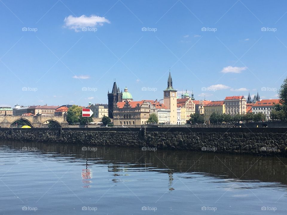 View of Prague. Blue sky and river. Prague skyline.