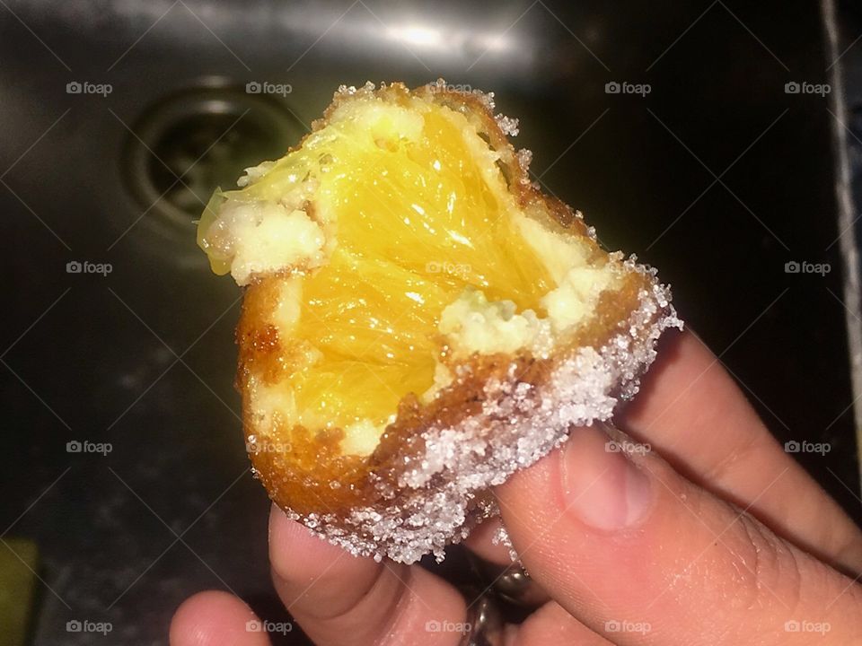 Fried orange pastry with cinnamon And sugar 